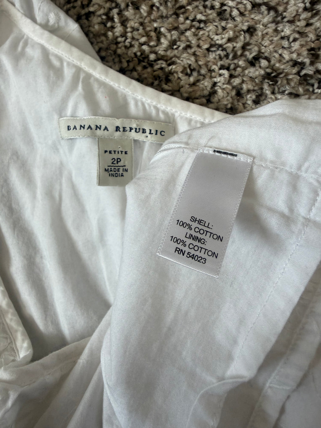 Banana Republic 100% Cotton Shell and Lining Size 2 Petite White One Shoulder Tank with Flower Detail